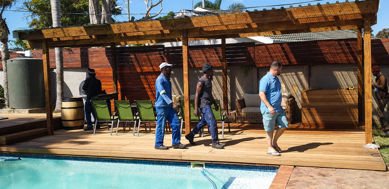 The Rod Timber Products team on a completed timber pool deck and pergola build