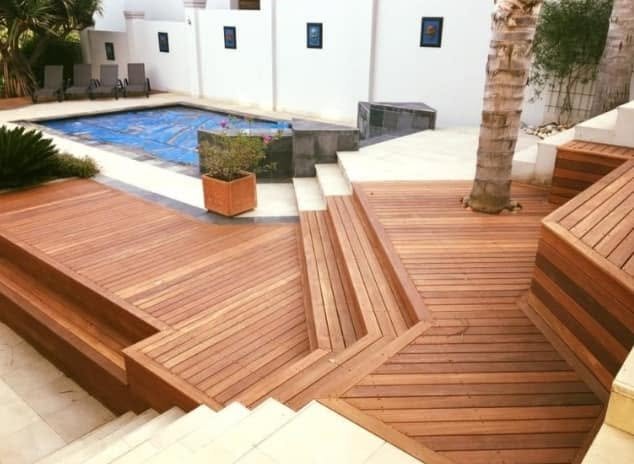 Multi-level timber pool deck with steps