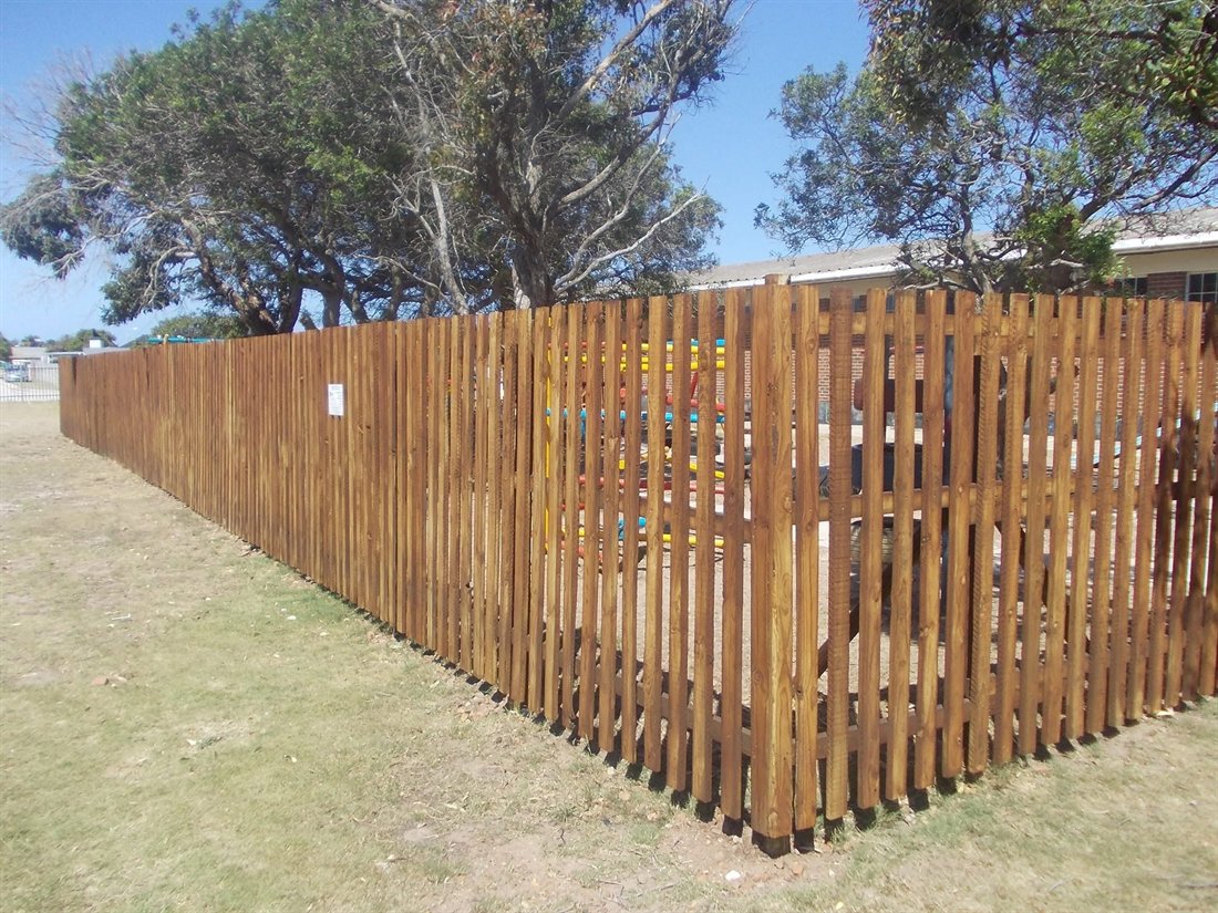 Timber paling fence around a school playground